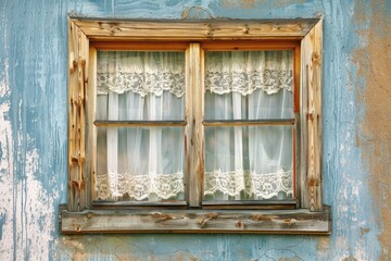 wooden window frame with lace curtains