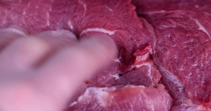 fresh raw pork meat on a cutting board, cooking pork meat on a cutting board