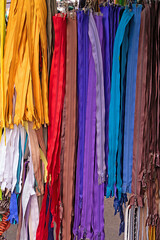 Colorful zippers used as tailor tool sold on local market