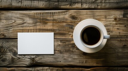 Simple white card mock up on a wooden table with a single cup of coffee, Early morning light casting a warm glow