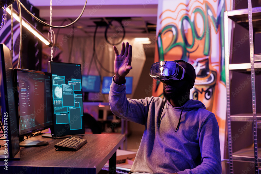 Poster hacker wearing vr glasses and getting unauthorized illegal access while exploring metaverse. african