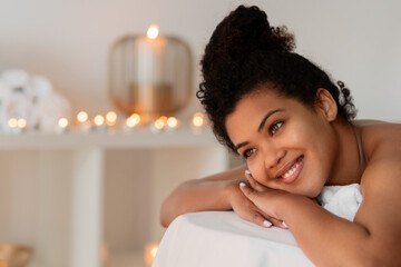 Relaxed african american woman at luxury spa