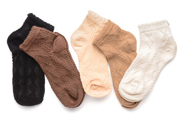 Different basic color socks on white background