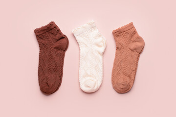 Basic color socks on beige background