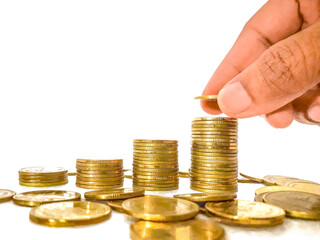 The right investments can make profits and create wealth. hand and coins