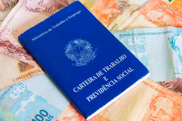 Brazilian work card. Registered work CLT and money from Brazil. Minimum wage Brazilian real money.