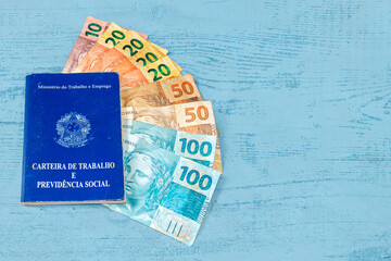 Brazilian work card. Registered work CLT and money from Brazil. Minimum wage Brazilian real money.