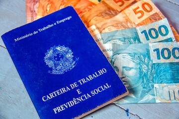 Brazilian work card. Registered work CLT and money from Brazil. Minimum wage Brazilian real money.