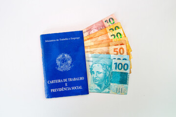 Brazilian work card. Registered work CLT and money from Brazil. Minimum wage Brazilian real money.