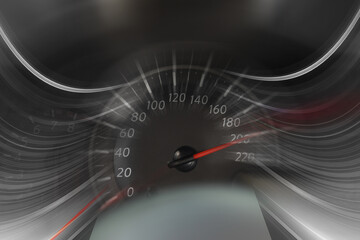 Speedometer on dashboard in car, motion blur effect