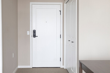 Interior door with door lever. Apartment door with deadbolt lock.
