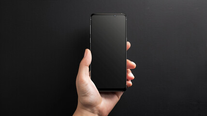a hand display a smartphone screen mockup on black backdrop