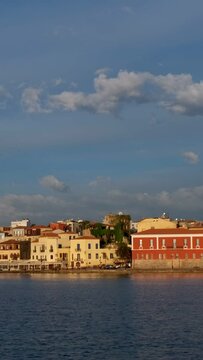 Picturesque old port of Chania is one of landmarks and tourist destinations of Crete island in the morning. Chania, Crete, Greece. Horizontal camera pan