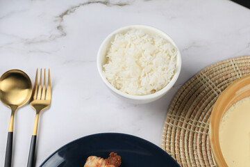 Thai Jasmine Rice in white bowl on table. Realistic Asian healthy food element.  