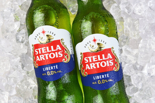 IRVINE, CALIFORNIA - 23 APR 2024: Closeup of two bottles of Stella Artois Liberte, an  Alcohol Free Beer on a bed of ice.