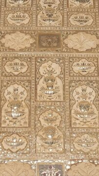 Exterior of the Wall and the canopy of the Mirror Room Inside Sheesh Mahal in Amer (Amber) Palace complex. Amer, Rajasthan, India. Vertical camera pan