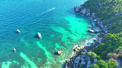 Koh Tao, nestled in the Gulf of Thailand, beckons with lush jungles, pristine beaches, and a...