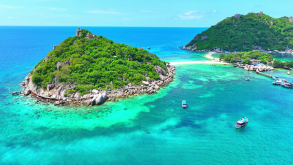 Koh Nangyuan boasts pristine beaches, clear waters, and stunning coral reefs, perfect for diving...
