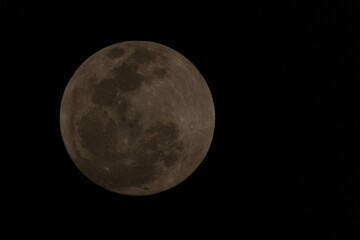 The full moon is a lunar phase that occurs when the Moon is completely illuminated as seen from Earth. This happens when the Earth is directly between the Sun and the Moon