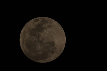 The full moon is a lunar phase that occurs when the Moon is completely illuminated as seen from Earth. This happens when the Earth is directly between the Sun and the Moon