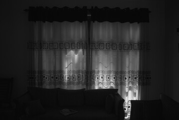 black and white abstract background of curtains early morning with sunlight, traditional sri lankan...