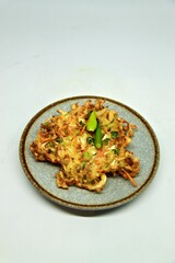 Bala-bala is one of the favorite snacks of West Javanese. This food is better known as bakwan. made from a mixture of wheat flour dough with several types of sliced carrots and cabbage and then fried.
