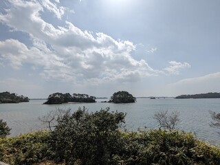 Fukuura island accessible via a long red bridge in matsushima bay