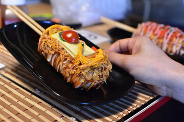 Take a close-up shot of cooking and food handling.