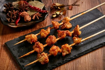 Delicious skewers of meat and vegetables on a plate