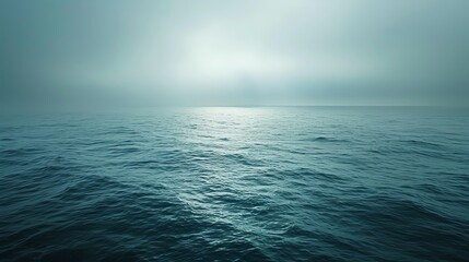 Serene ocean view under a muted sky, conveying the echoing silence of nature, vast waters reflecting the stillness and solitude - obrazy, fototapety, plakaty