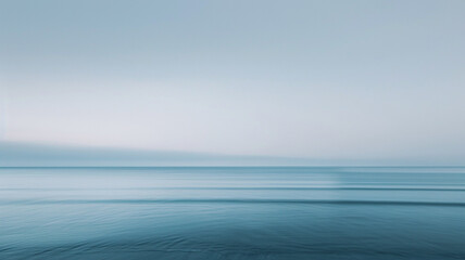 A calming palette of translucent dusky blue and gentle gray, overlaid to form a minimalist background that evokes the quiet solitude of a dusk-lit beach - obrazy, fototapety, plakaty