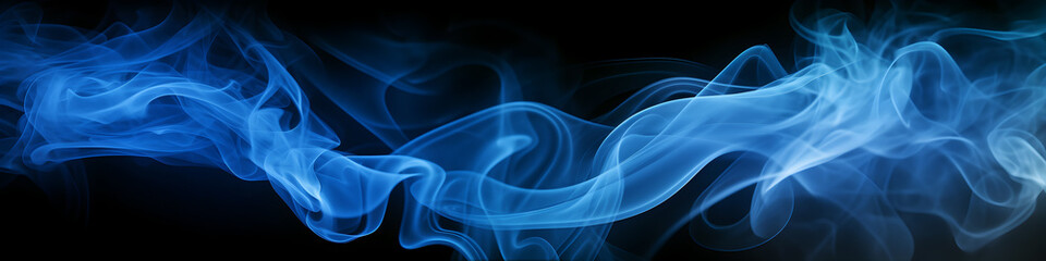 Obraz premium Whispers of blue smoke on a black background.