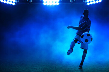 3d illustration shadow silhouette of young professional soccer player kicking ball in empty stadium at night