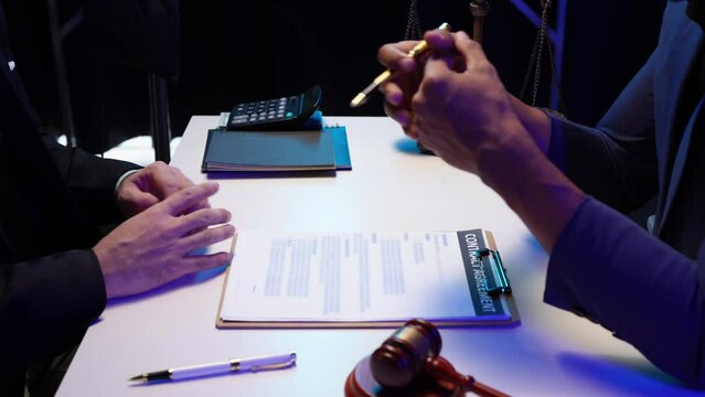 Lawyer, legal advisor, businessman brainstorming clarifying agreement details business contract Joint financial investments in office real estate projects.