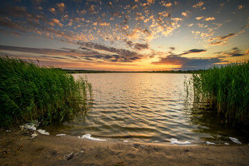 Beautiful summer sunset over the lake