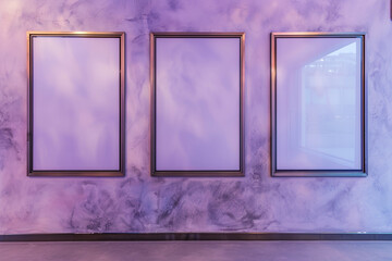 Ultra-modern museum space with three empty brushed steel frames on a soft lavender wall