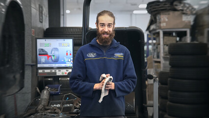 Technician work car service. Auto mechanic portrait. Cute smile engineer look at camera closeup....