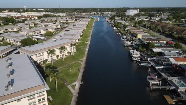Aerial view of waterfront condos and homes in New Port Richey, Florida