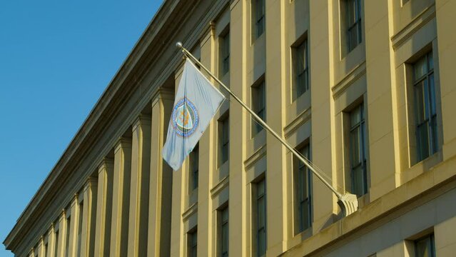 The flag of the Federal Trade Commission waves in a morning breeze in Washington DC