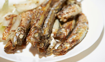 fried anchovies on plate