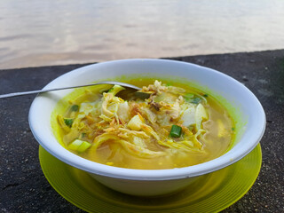 Delicious porridge gravy. Porridge or chicken porridge in Indonesian native called bubur ayam is a popular breakfast menu