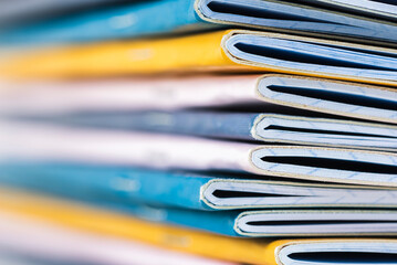 Pile of paper notebooks macro view