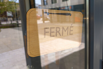 vintage wooden panel shop sign ferme french text means we are closed board on store entrance