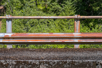 Guardrails on a bridge crossing the North Fork Willamette River in the Willamette National Forest...