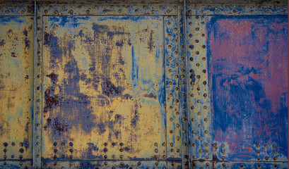 Photo closeup old rusty grunge steel aluminum fragment of protective structure made of metal plates...