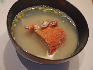 Bowl of japanese Ise ebi lobster miso soup, big chop of lobster in broth 