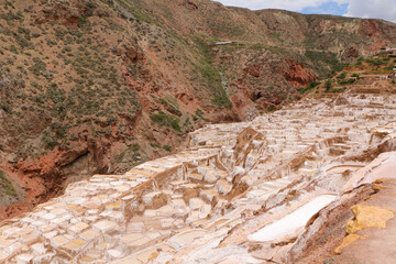 Salt evaporation ponds in Maras salt mines in Cusco city the Sacred Valley, Peru