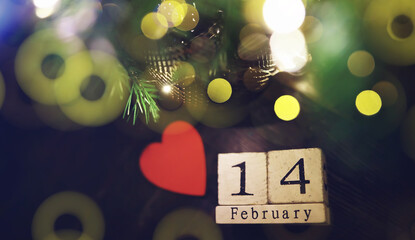 Wood cubes with 14 February date calendar. concept of Saint Valentine's.