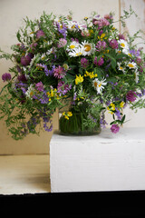 still life bouquet of wild flowers daisies