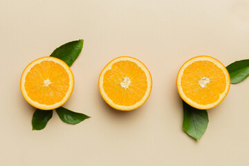 fresh Fruit orange slices on colored background. Top view. Copy Space. creative summer concept....